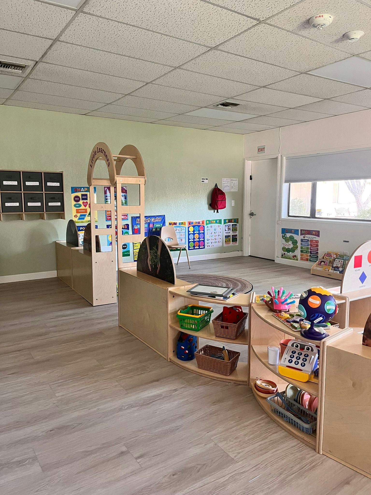 Classroom with wooden dividers and shelves