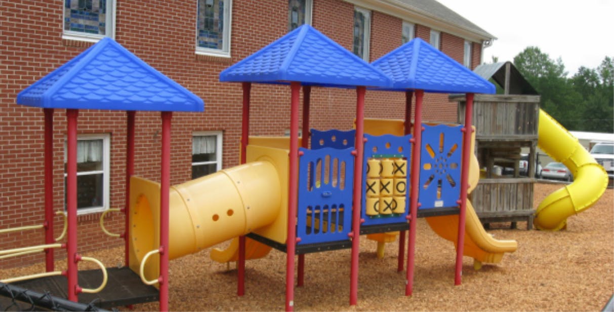Playground with slides and climbing structures