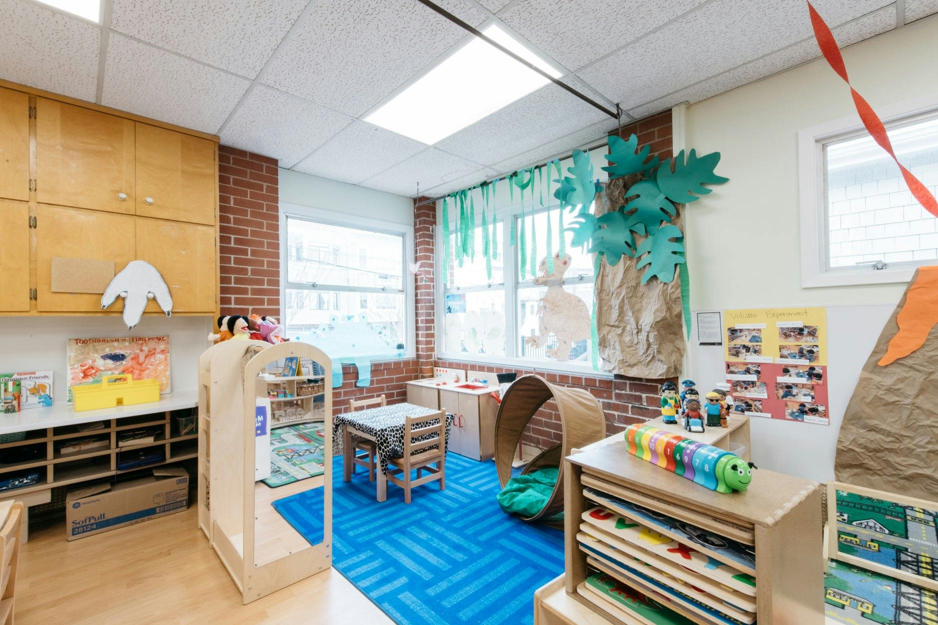 Classroom with child-sized furniture and colorful decorations