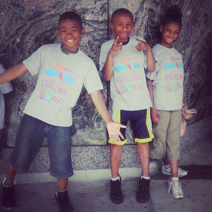 Three children posing for a photo