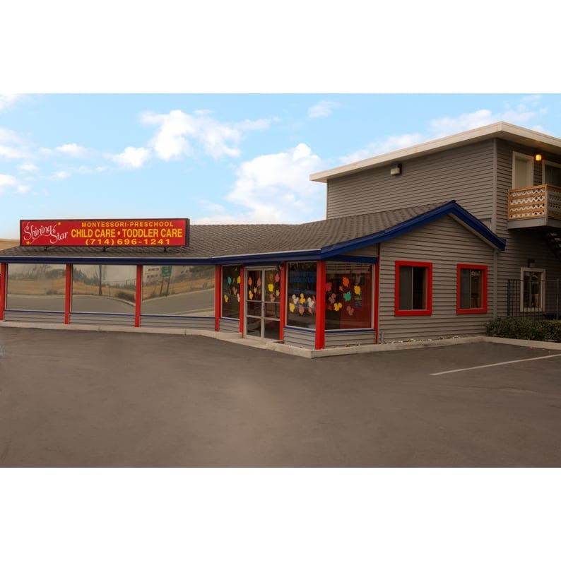 Building with a sign that reads "Child Care Toddler Care"