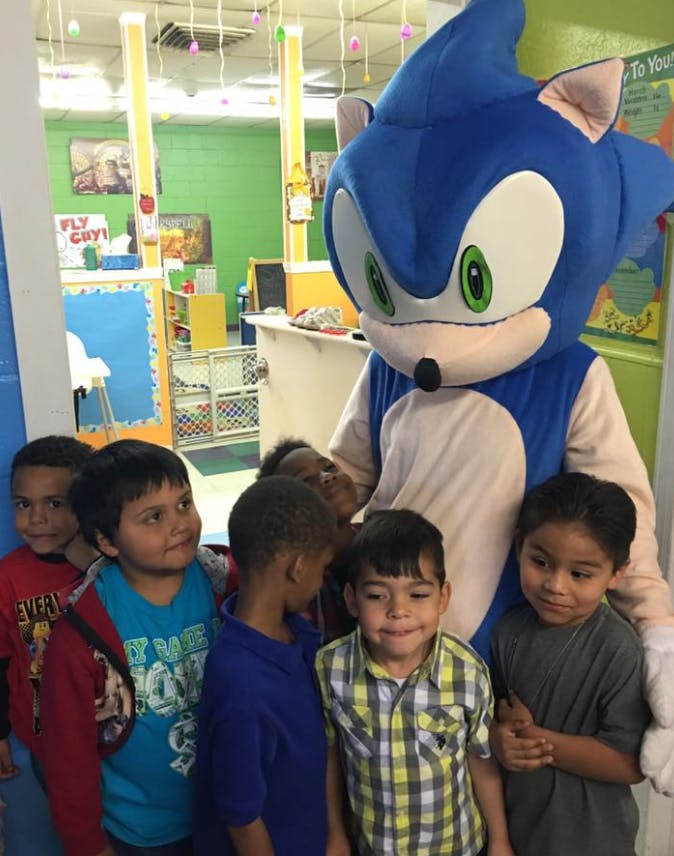 Mascot with a group of children