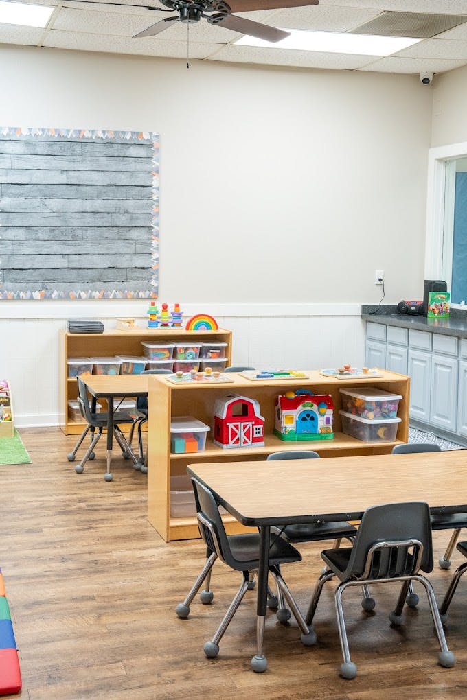 Classroom tables and toy storage shelves