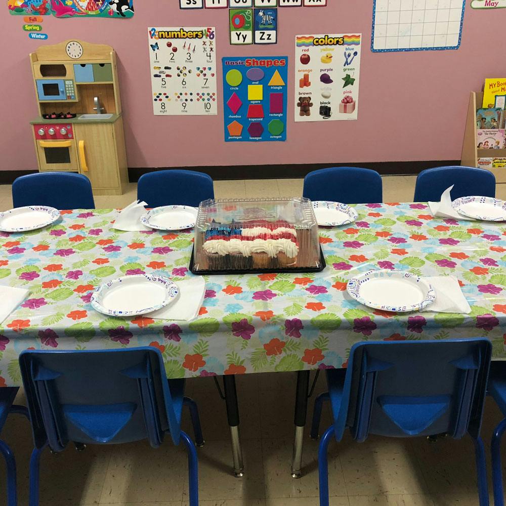 Table with cupcakes decorated like an American flag