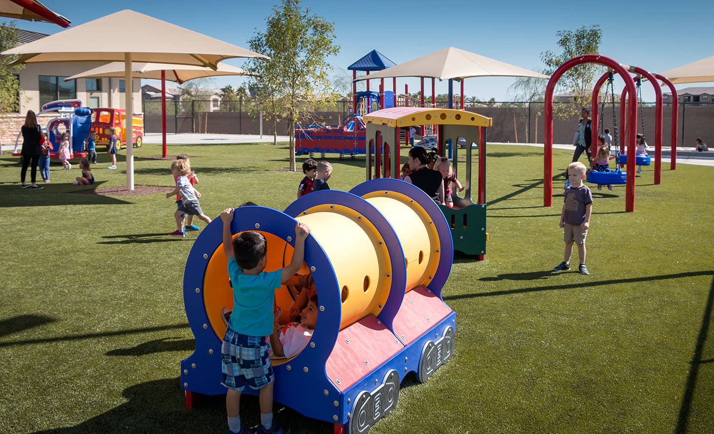 Children playing on playground equipment