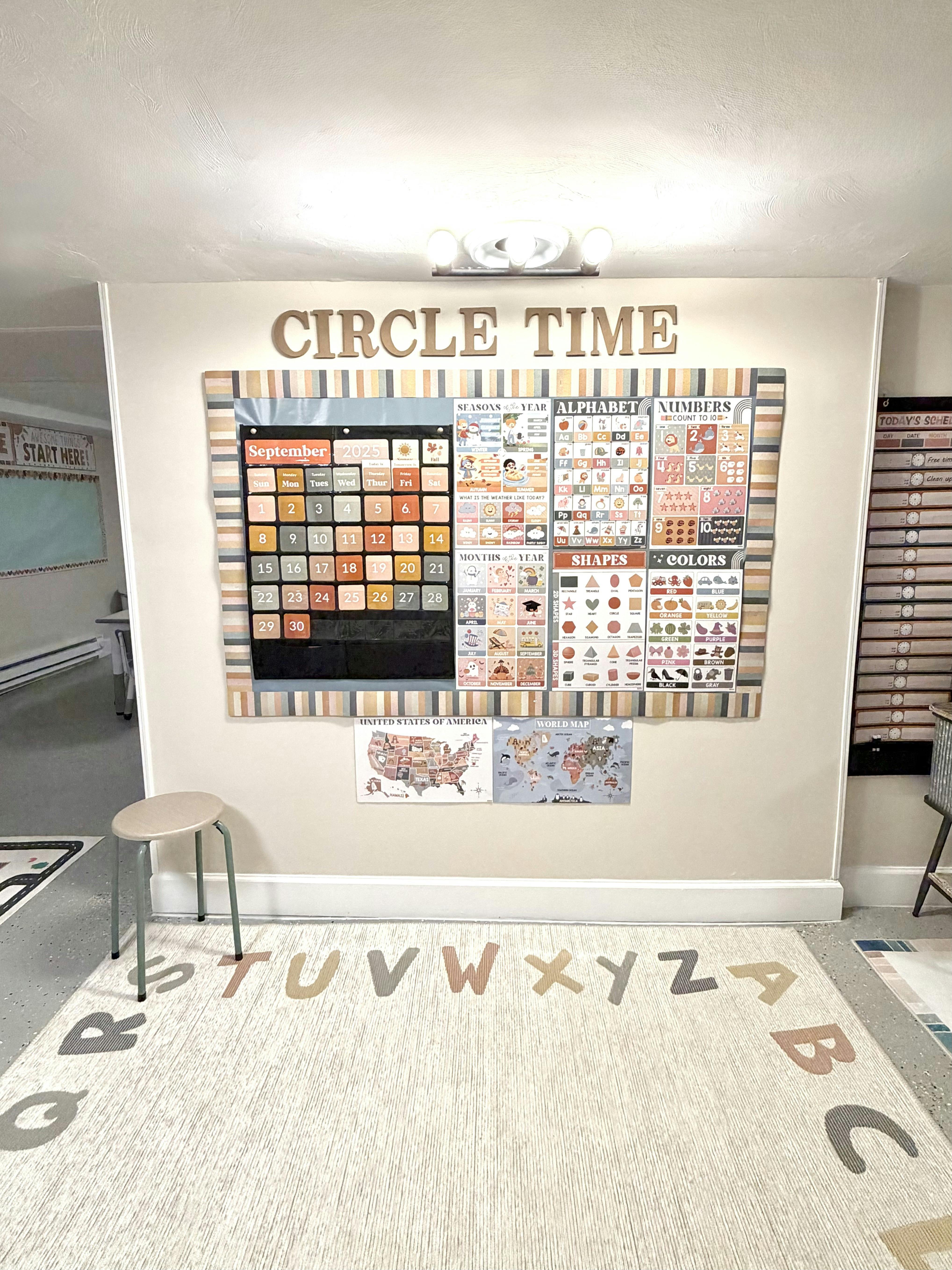 Classroom wall with "Circle Time" sign, calendar, educational posters, and maps