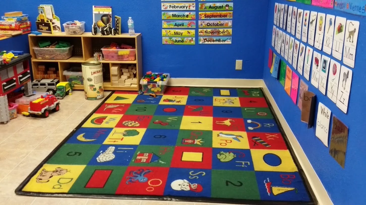 Colorful alphabet rug in a classroom