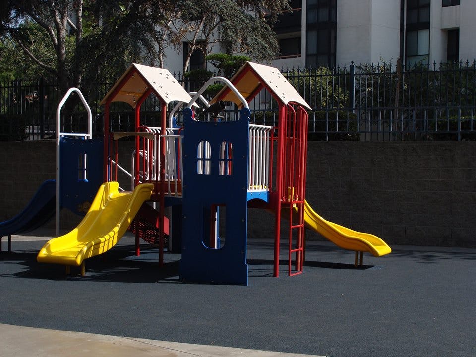 Playground with slides and climbing structures