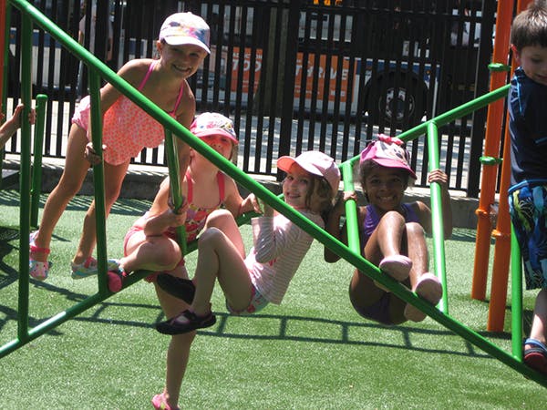 Children playing on a jungle gym
