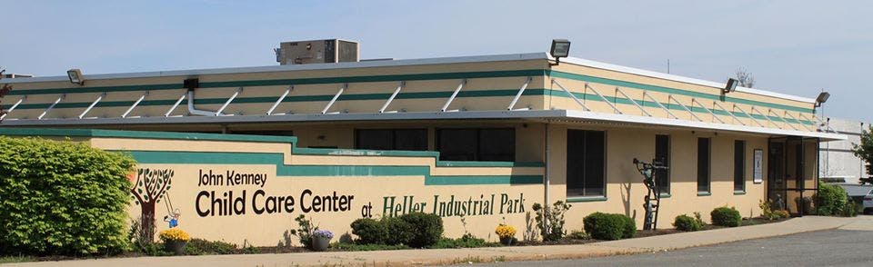 John Kenney Child Care Center building with text on the facade
