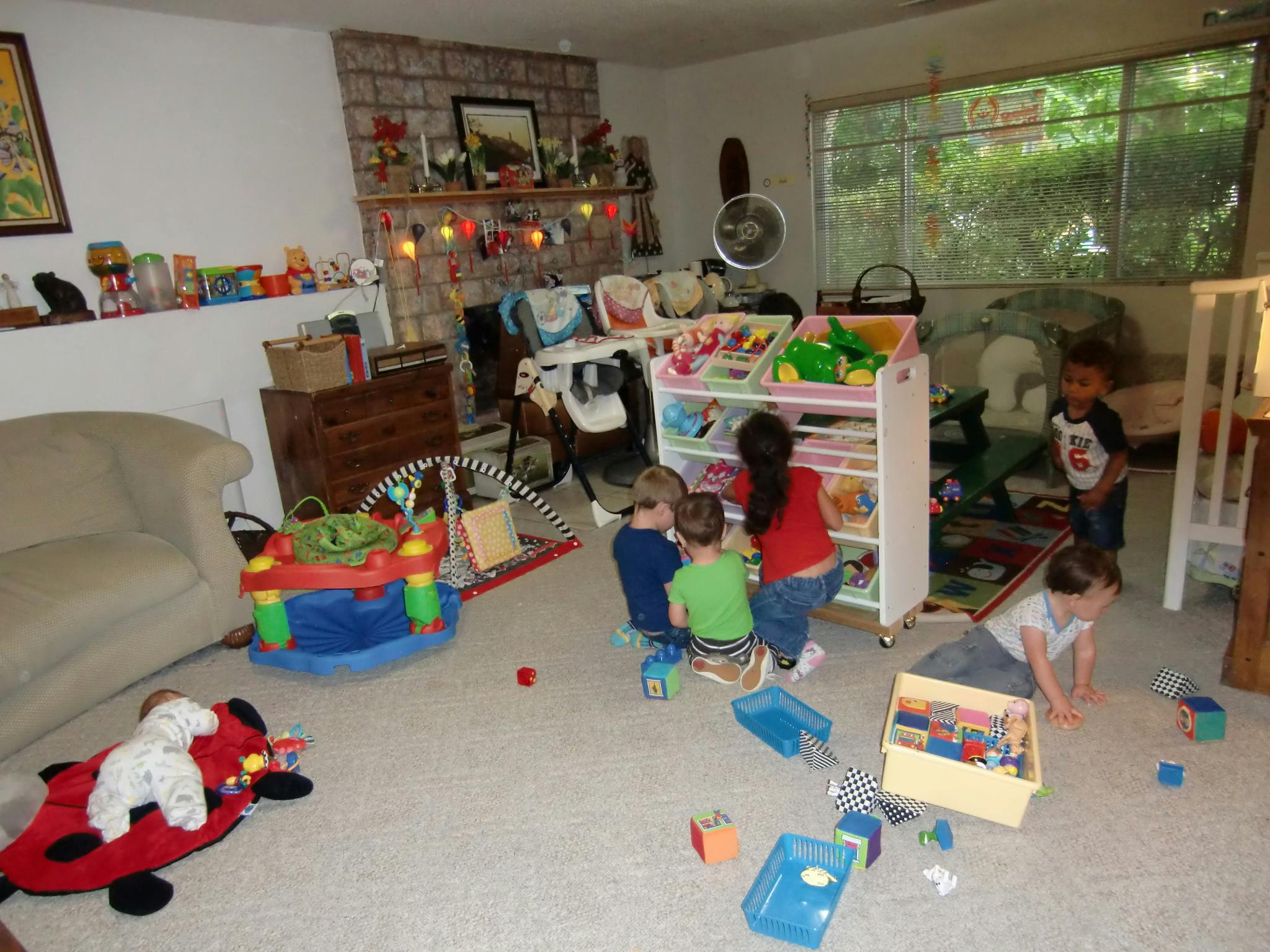 Children playing with toys in a room