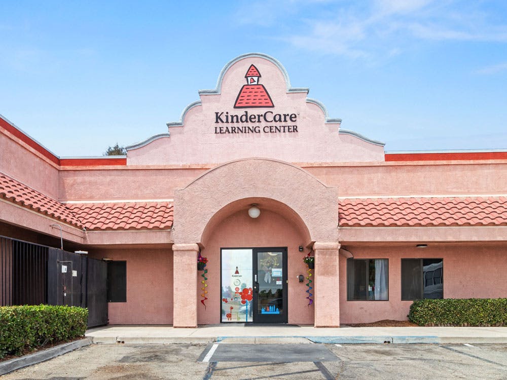 KinderCare Learning Center building entrance with an archway