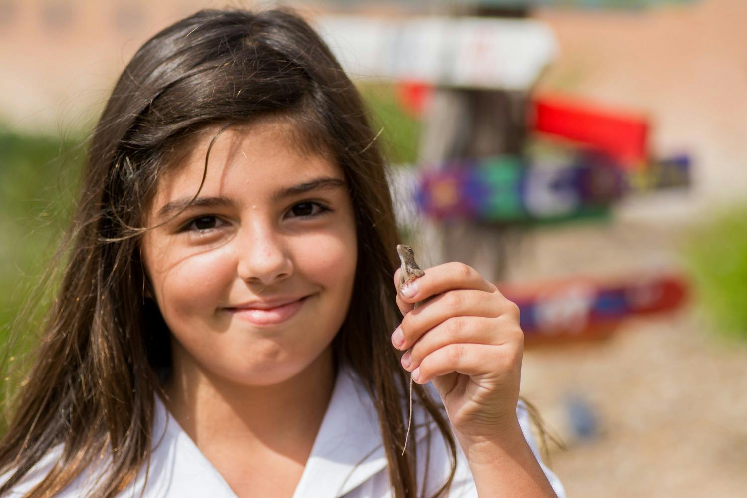 Child holding a small object
