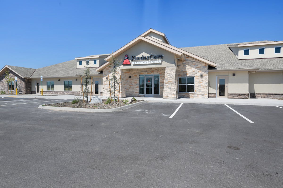 KinderCare Learning Centers building with a parking lot