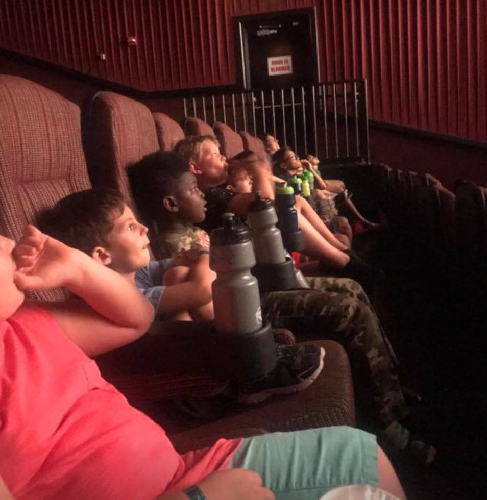 Children sitting in a movie theater