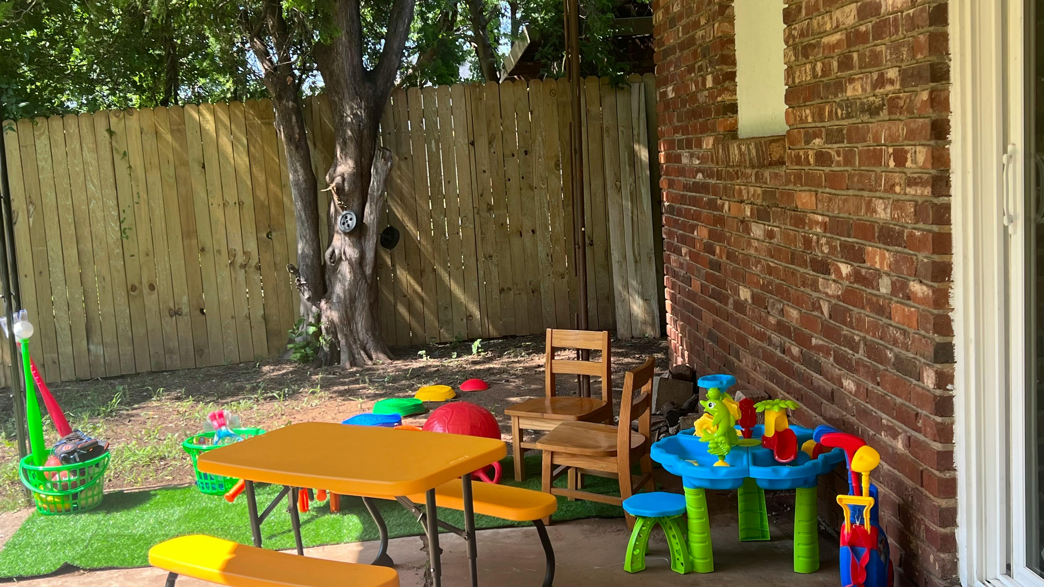 Patio with children's play tables and chairs