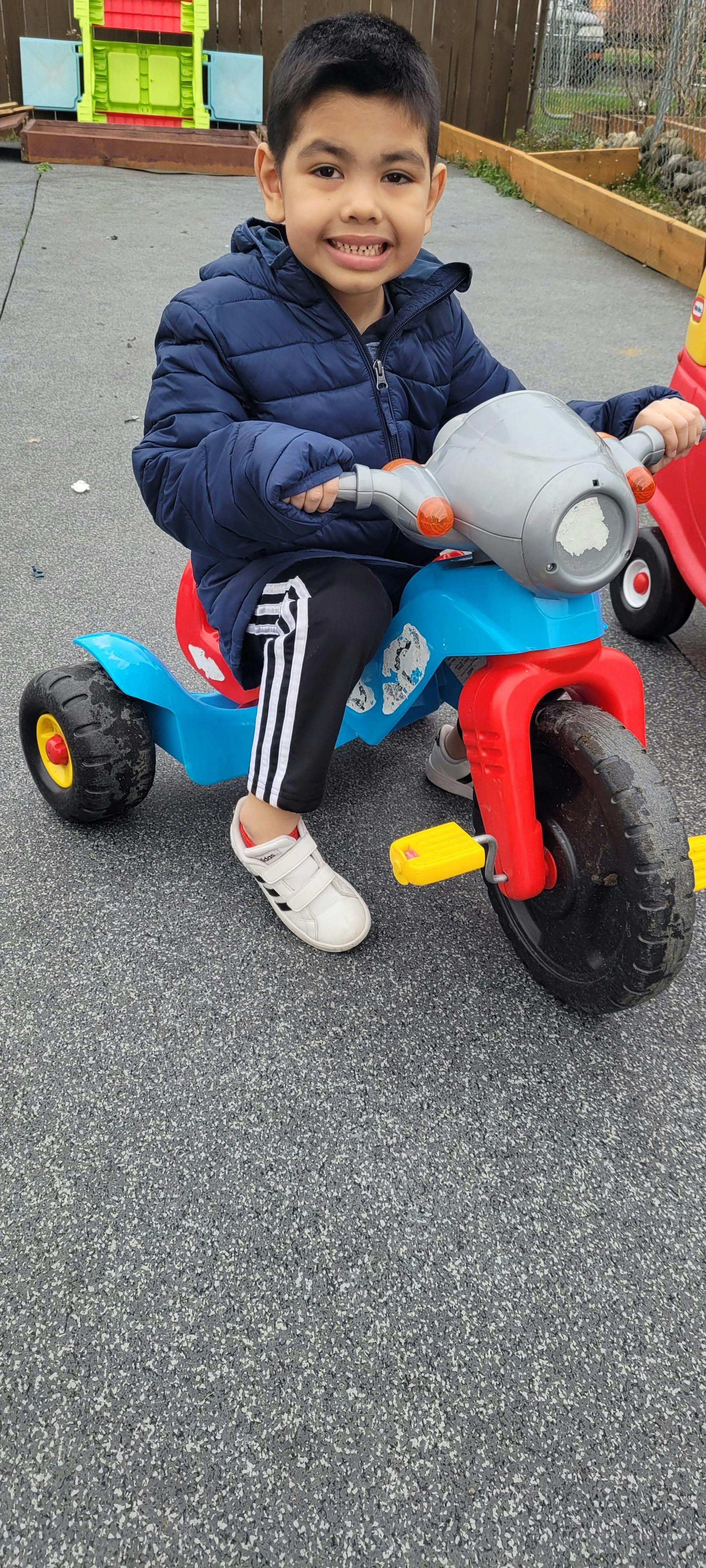 Child on a tricycle