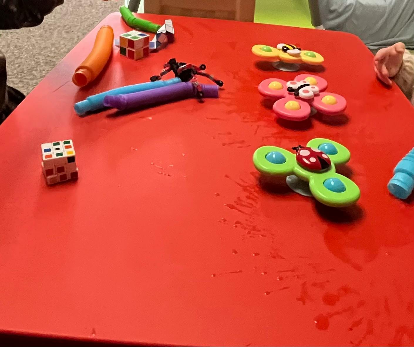 Toys on a red table