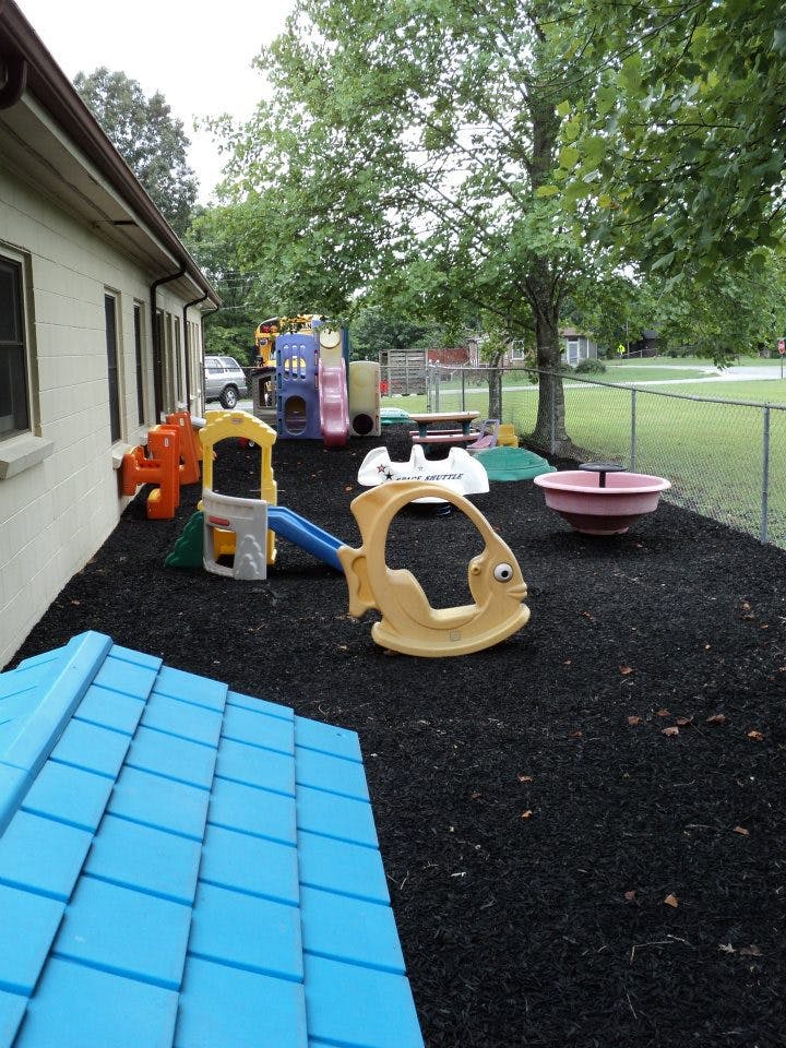 Outdoor playground with various colorful play structures