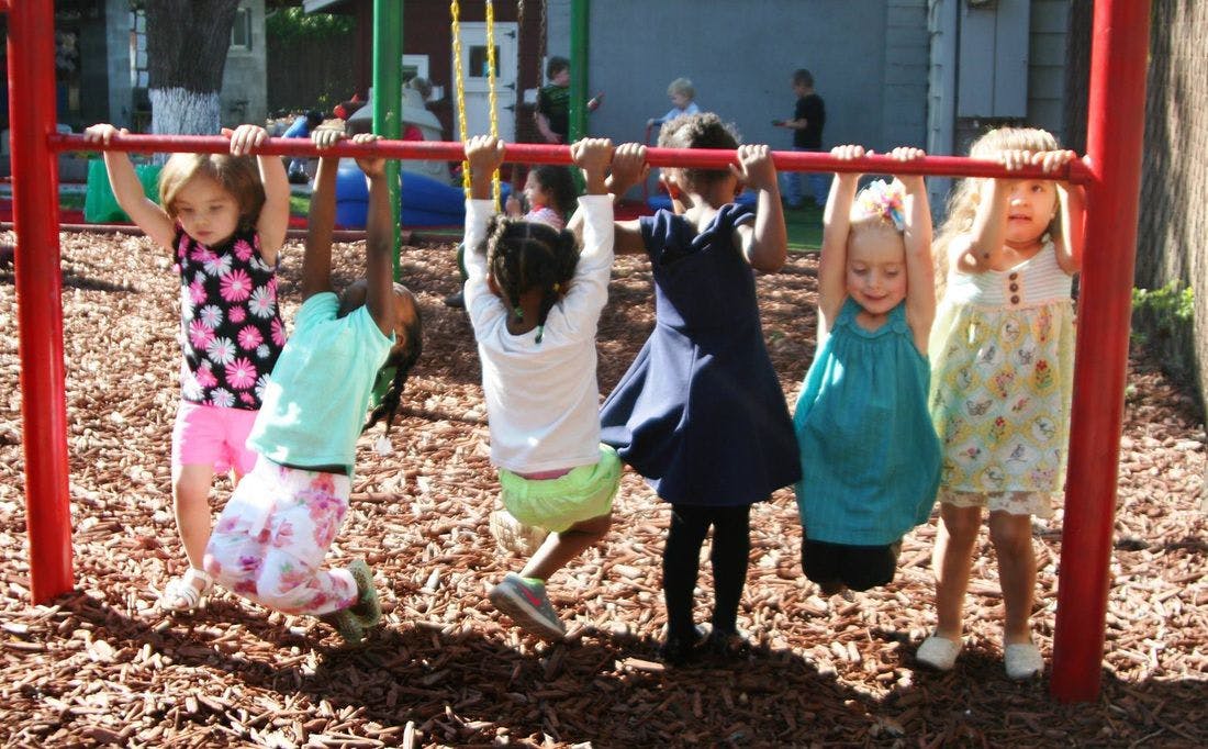 Children playing on monkey bars