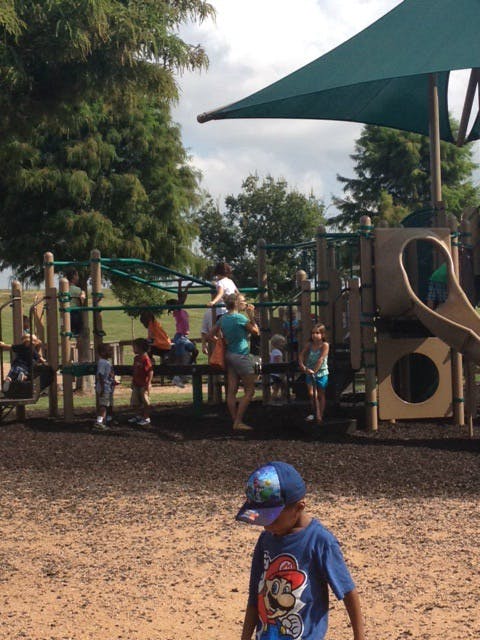 Children and adults on a playground