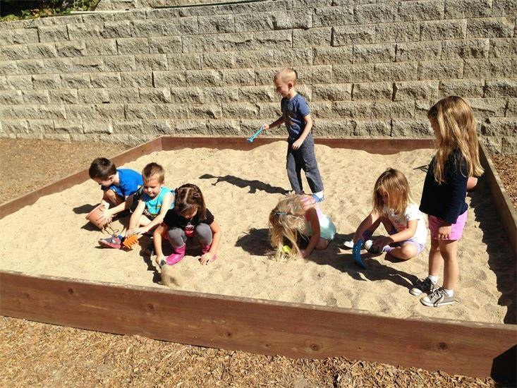 Children playing in a sandbox