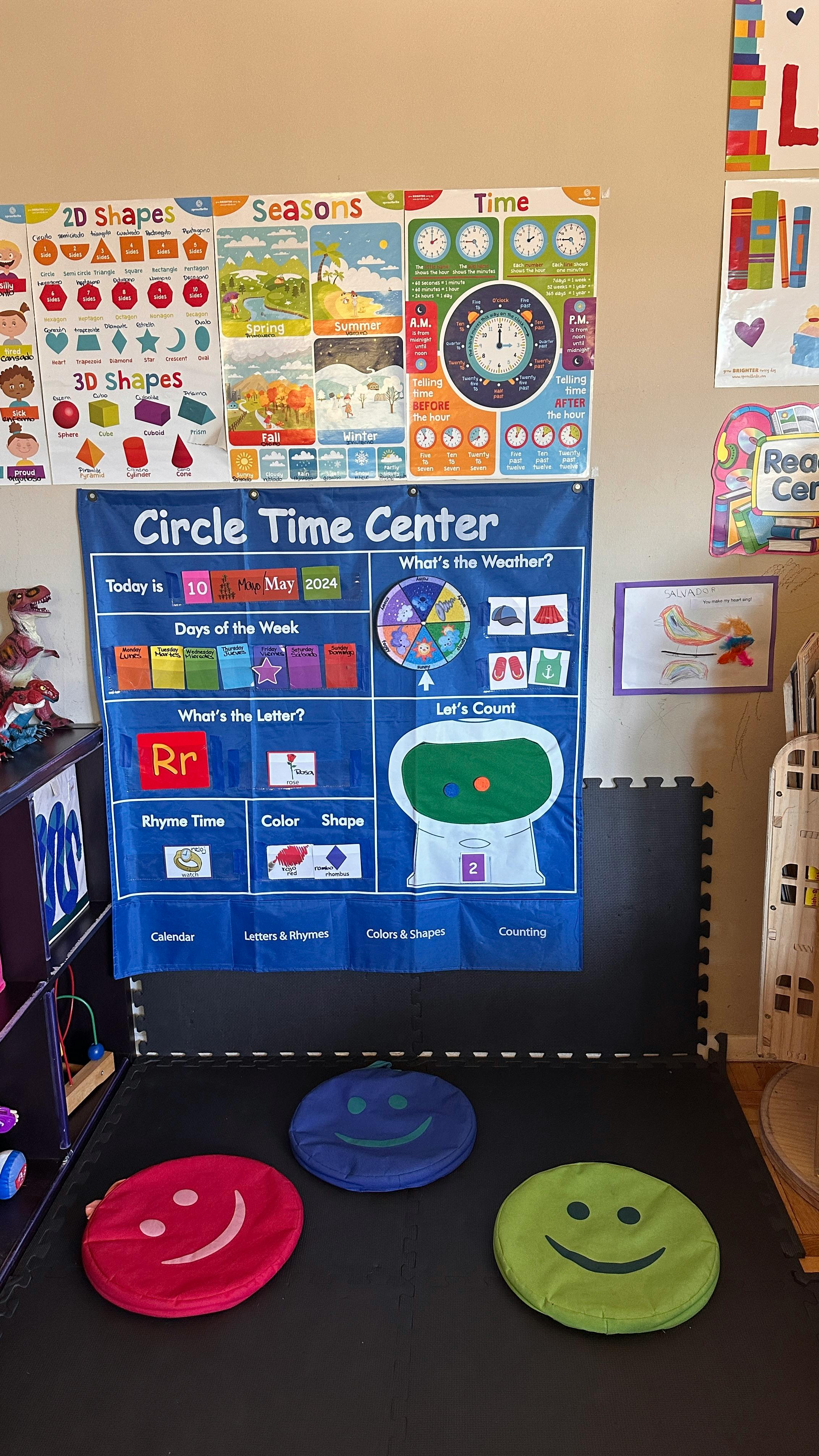 Circle Time Center chart with learning posters and floor cushions