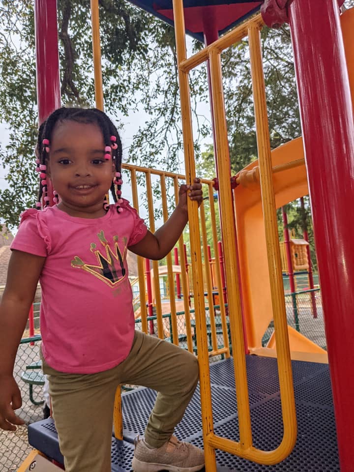 Child on a playground structure