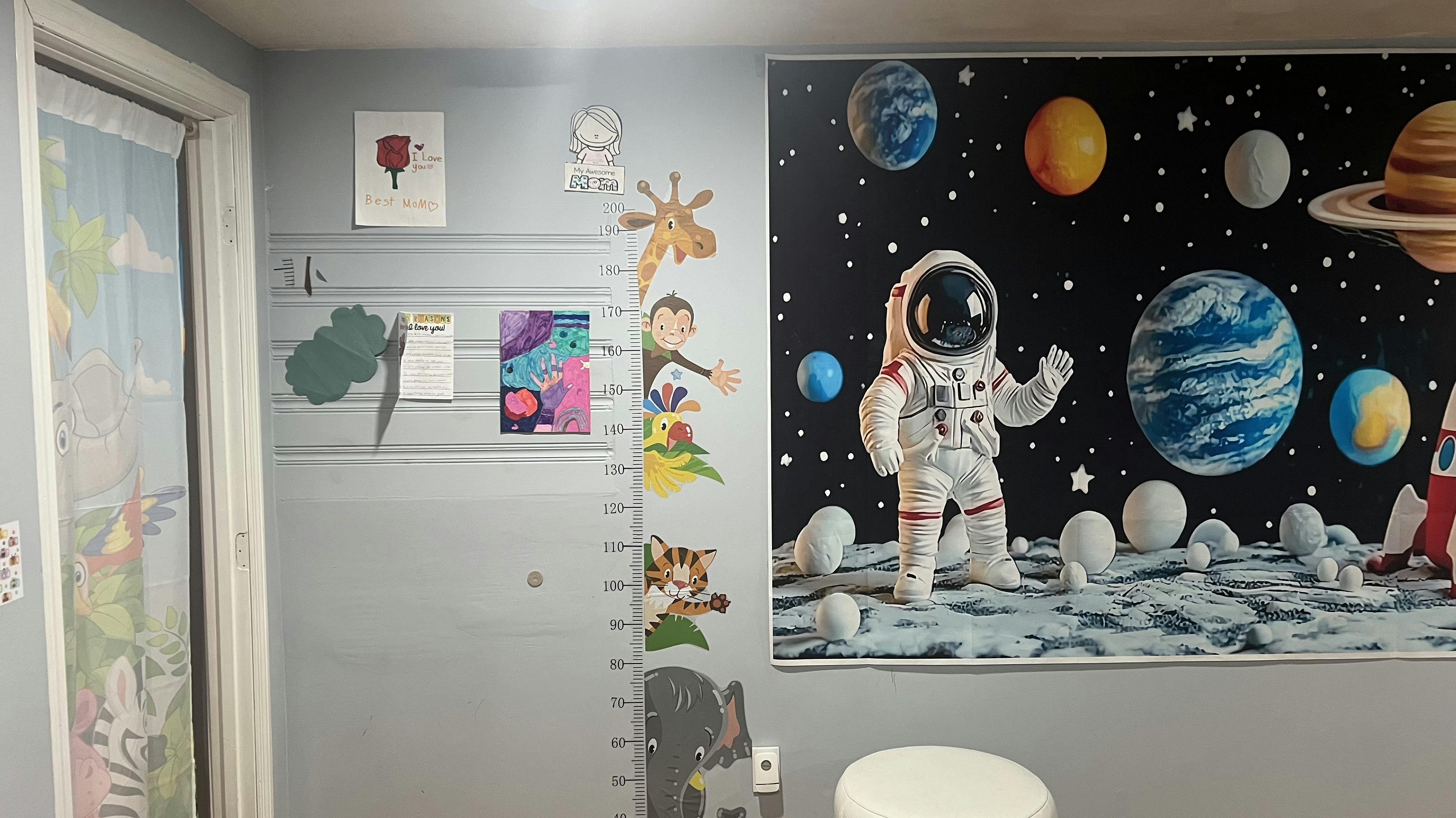 Child growth chart and space theme wall decorations