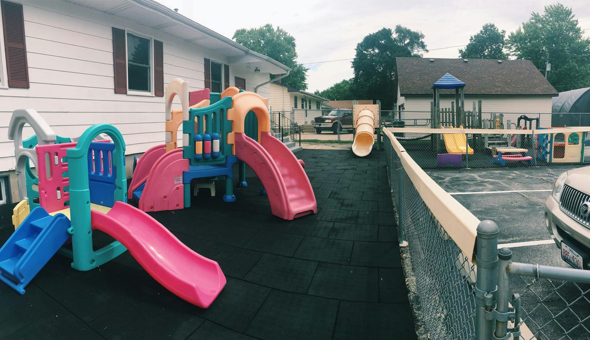 Playground with multiple colorful slides and play structures