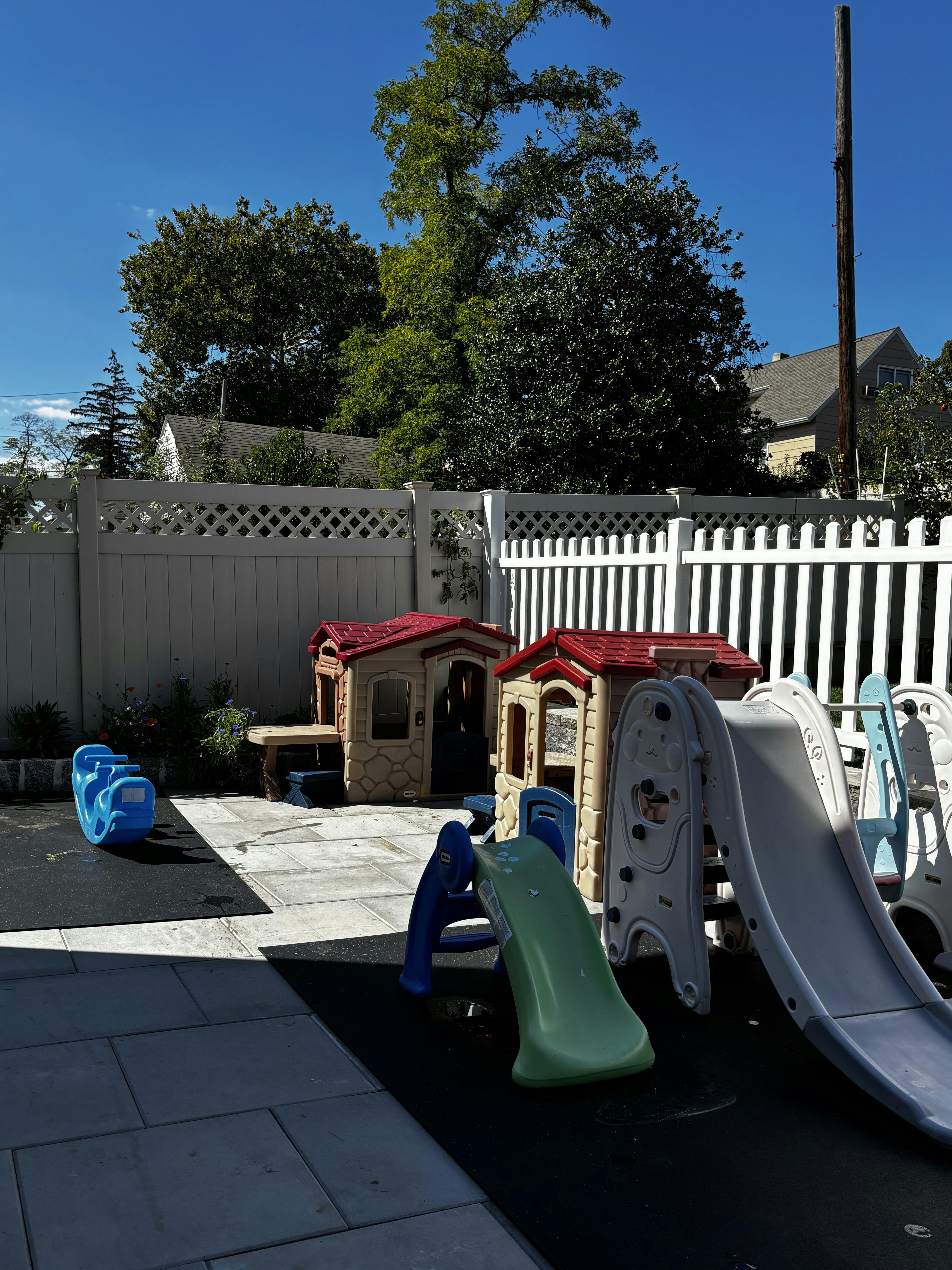 Playground with slides and playhouses