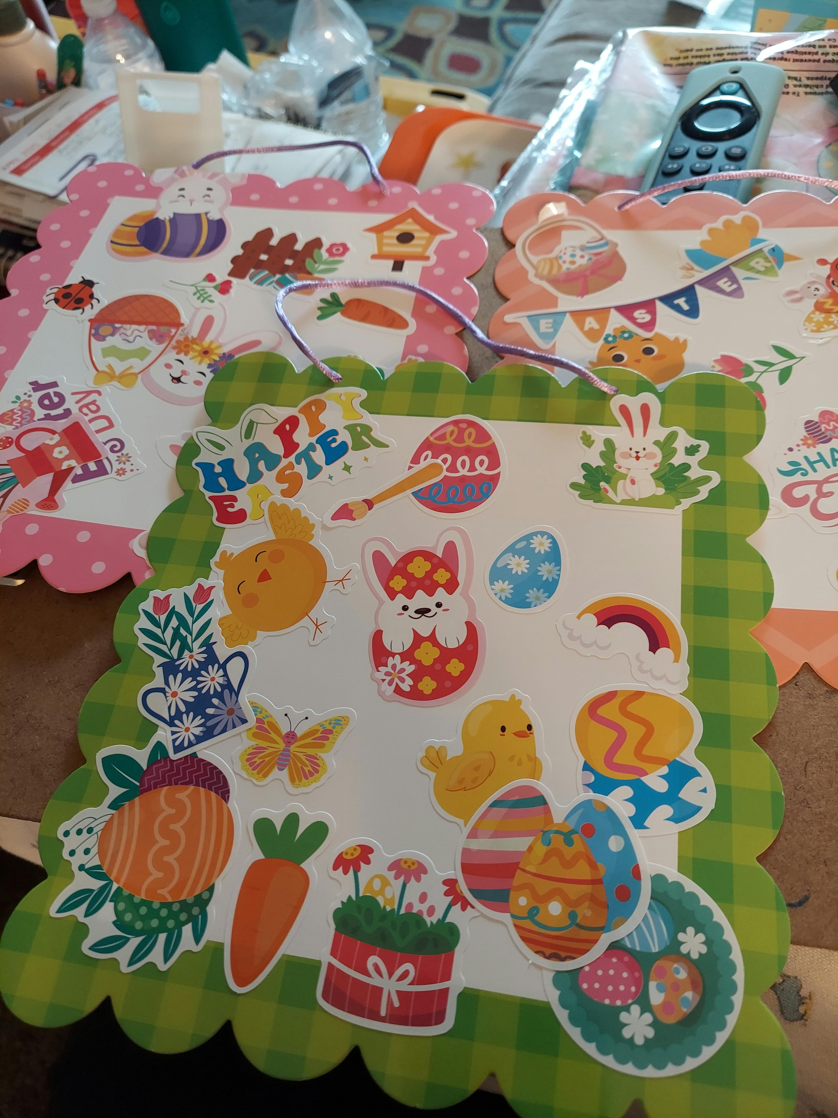 Easter-themed craft with stickers of bunnies, eggs, and carrots