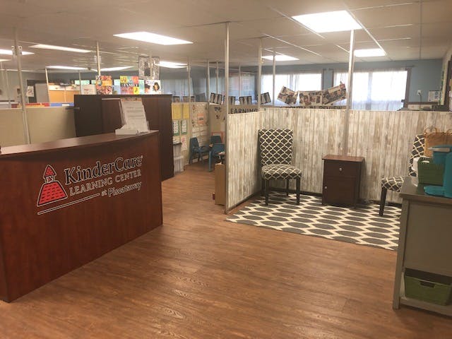 Reception desk with KinderCare Learning Center at Piscataway logo