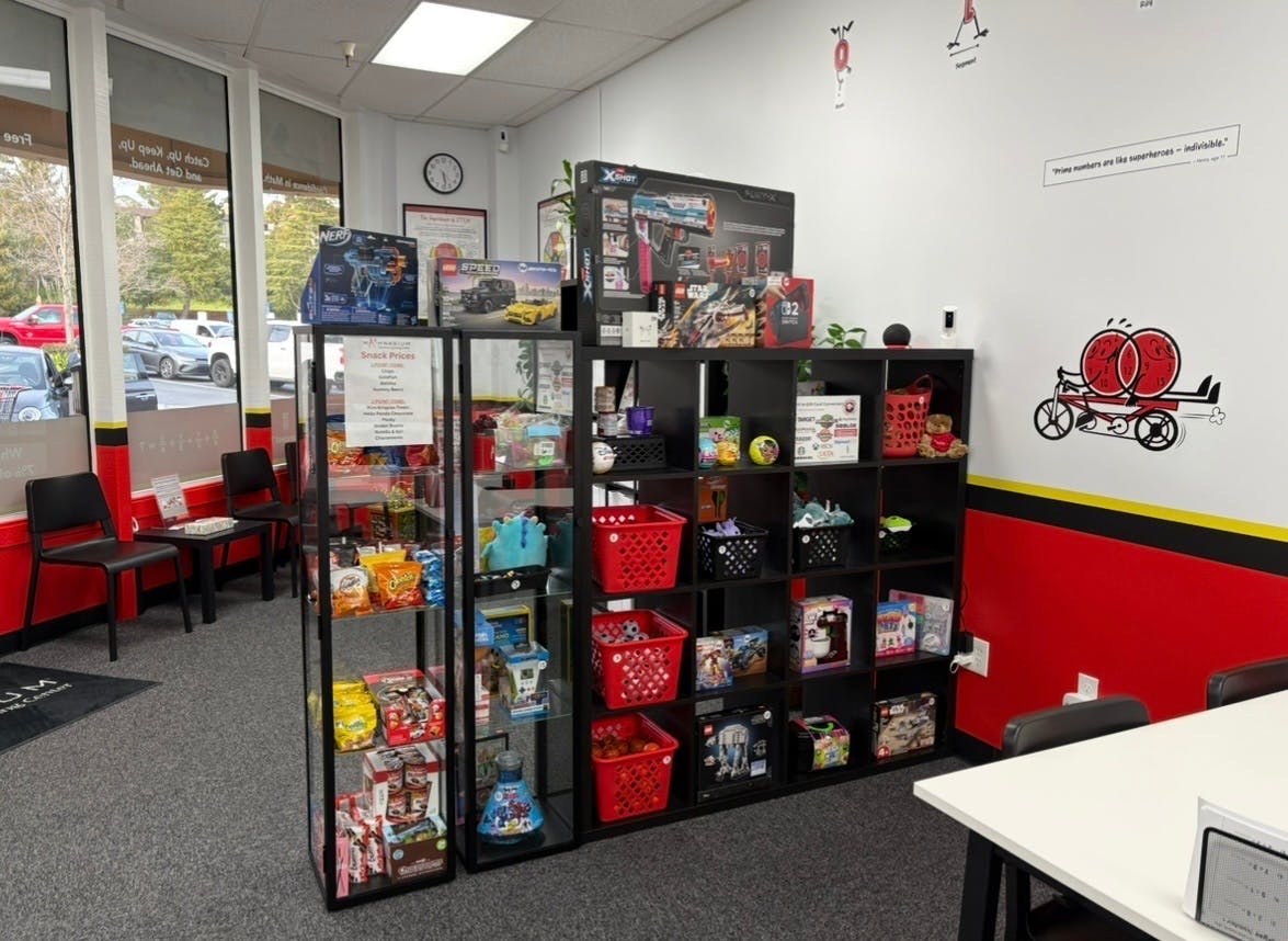 Retail display shelves with toys and snacks in a store