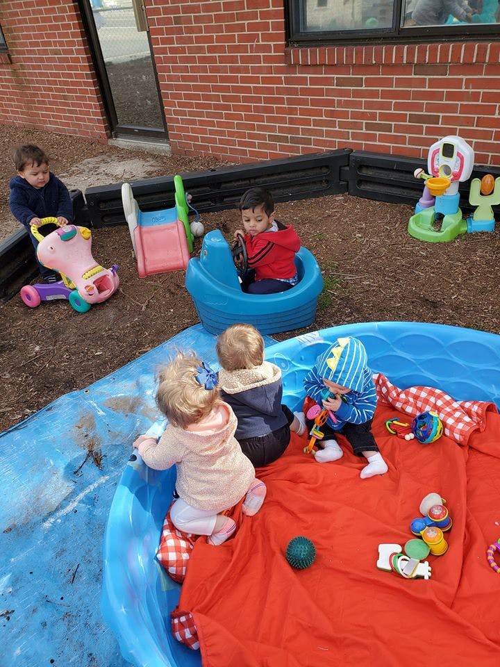 Children playing with toys outdoors