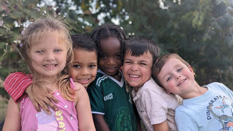 Five children posing together