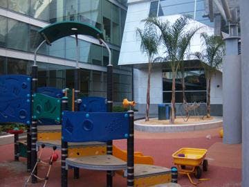 Playground with blue and yellow equipment