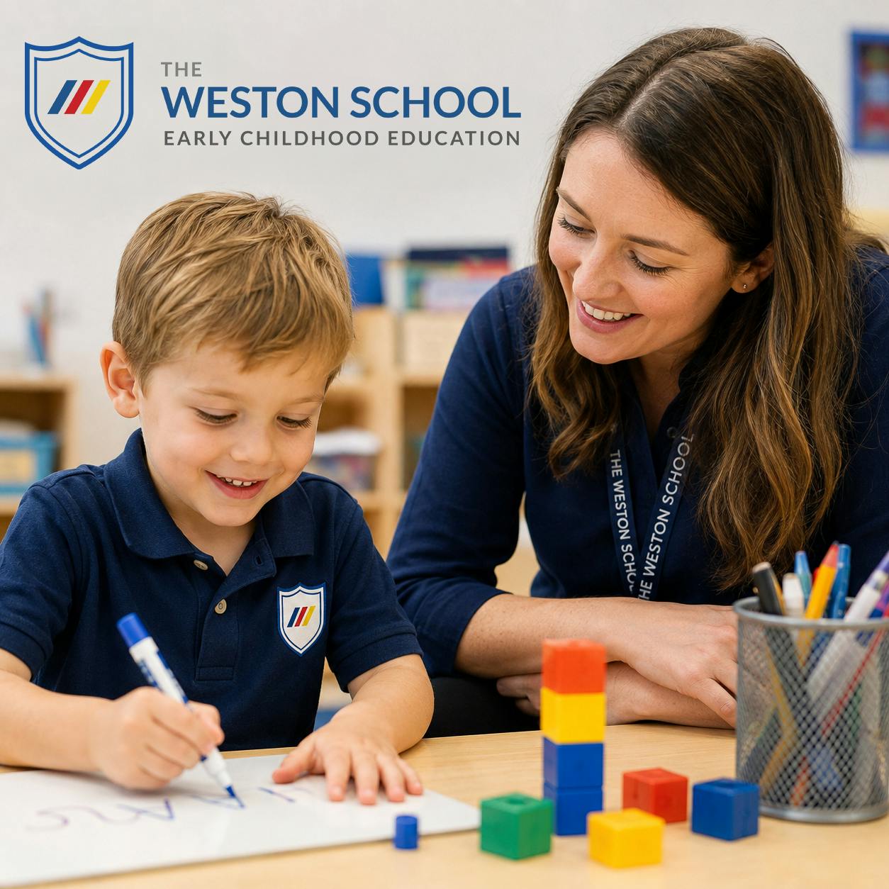 A person and a child coloring at a table in a classroom