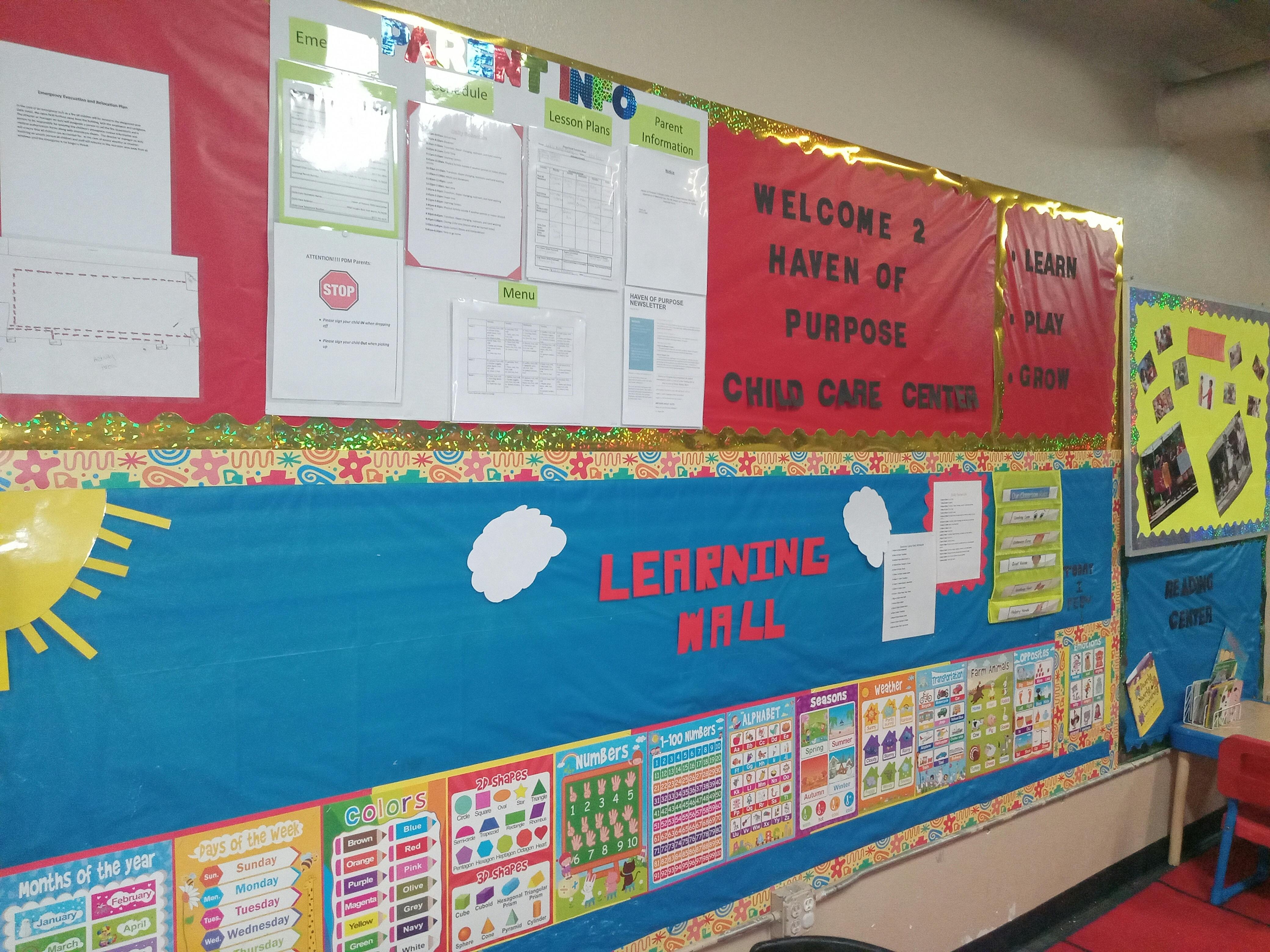 Classroom wall with bulletin boards and learning materials