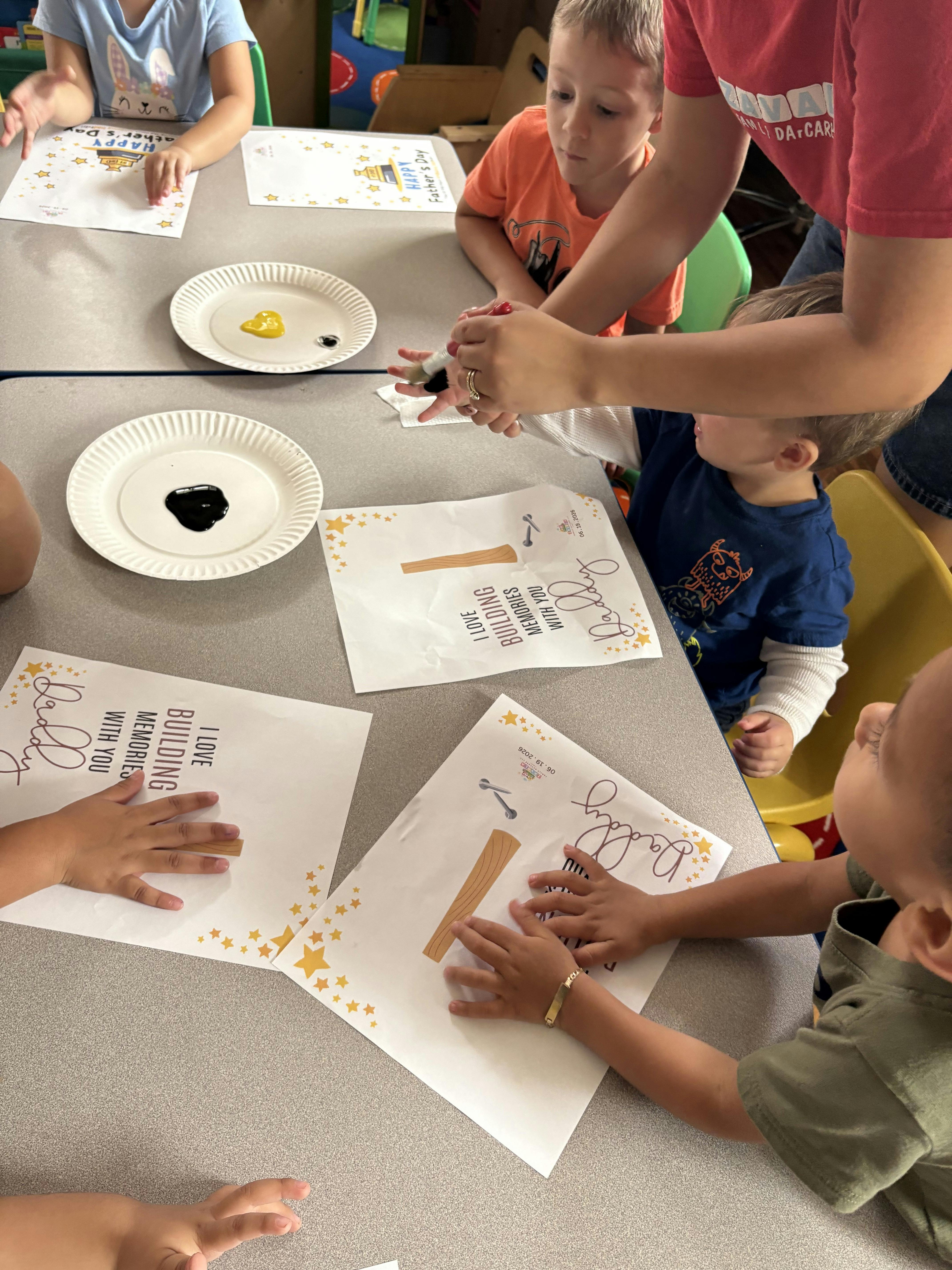 Group of children doing a craft project at a table