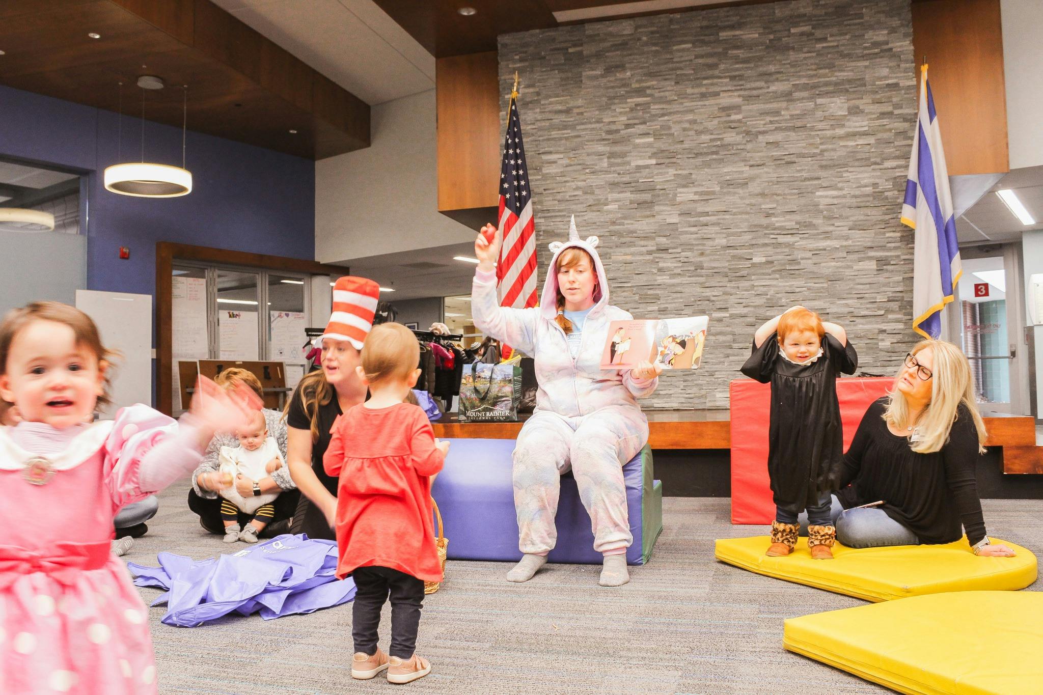 People and children in costumes at an event