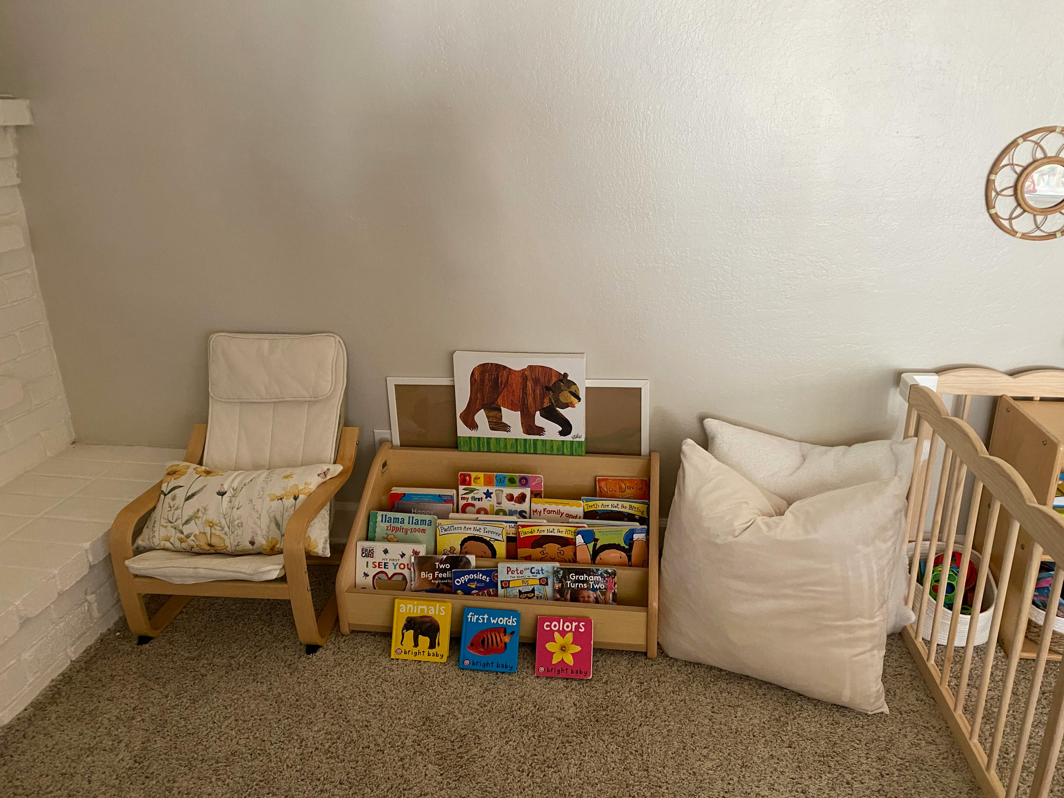 Child's chair next to a bookshelf filled with books