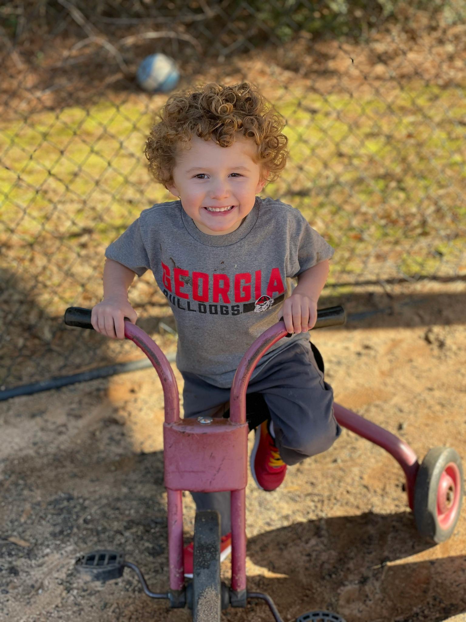 Child on a tricycle