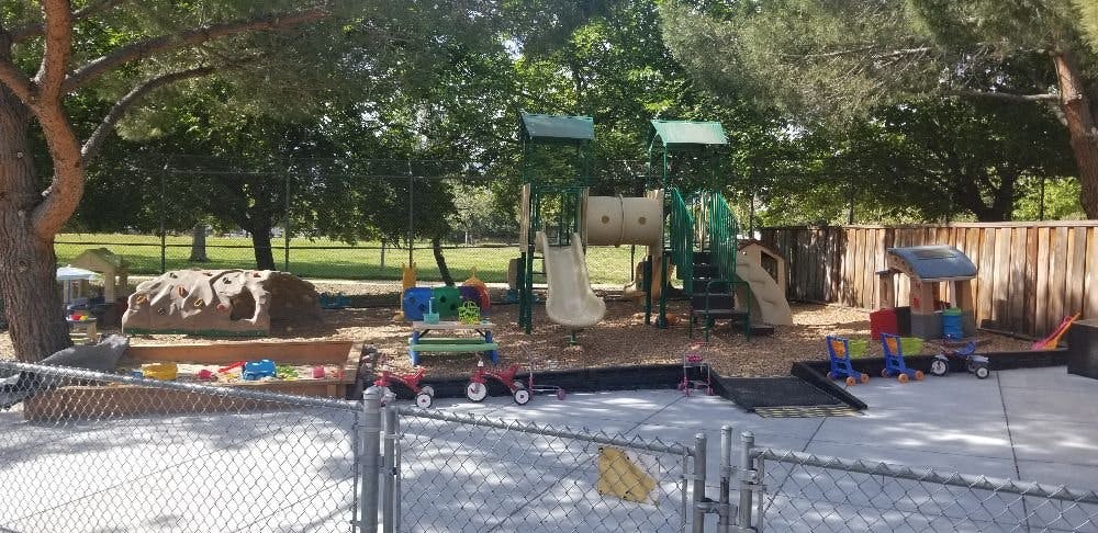 Playground with slides, climbing structures, and sandpit