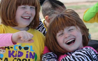 Two children laughing