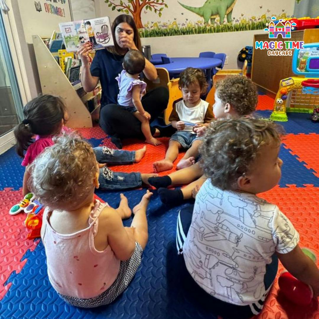 Person reading a book to a group of children in a classroom