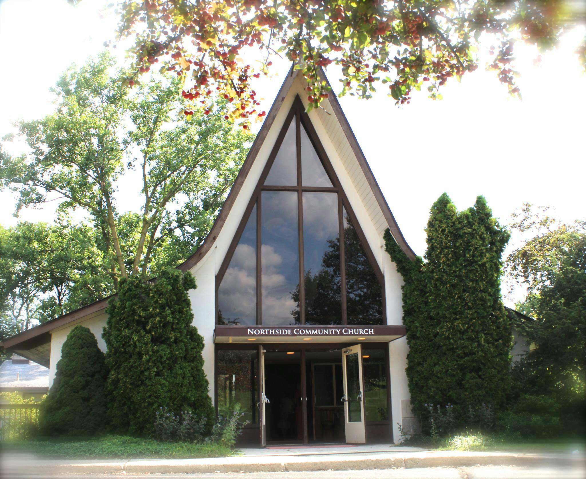 Northside Community Church building with large A-frame window