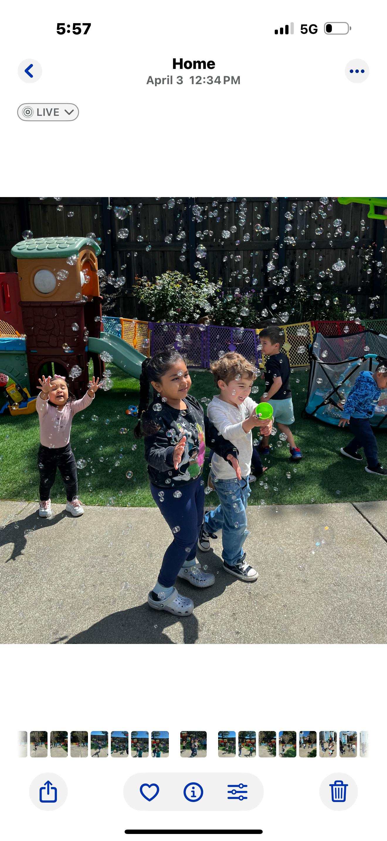 Children playing with bubbles outdoors