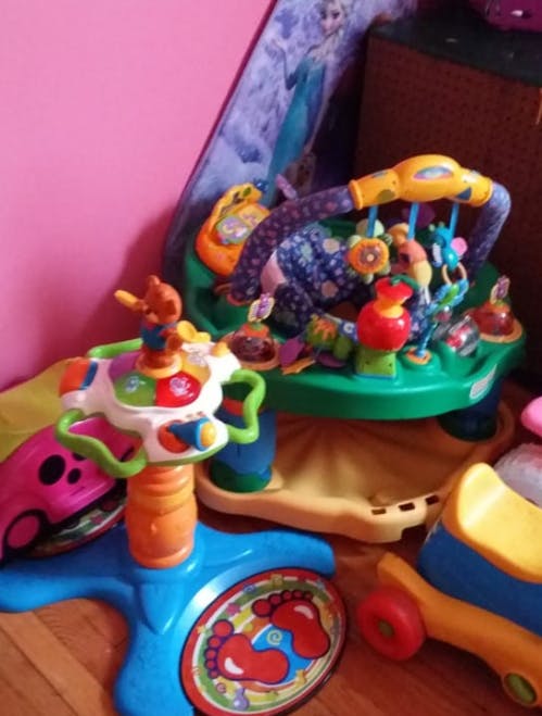 Baby activity center and walker with a baby walker
