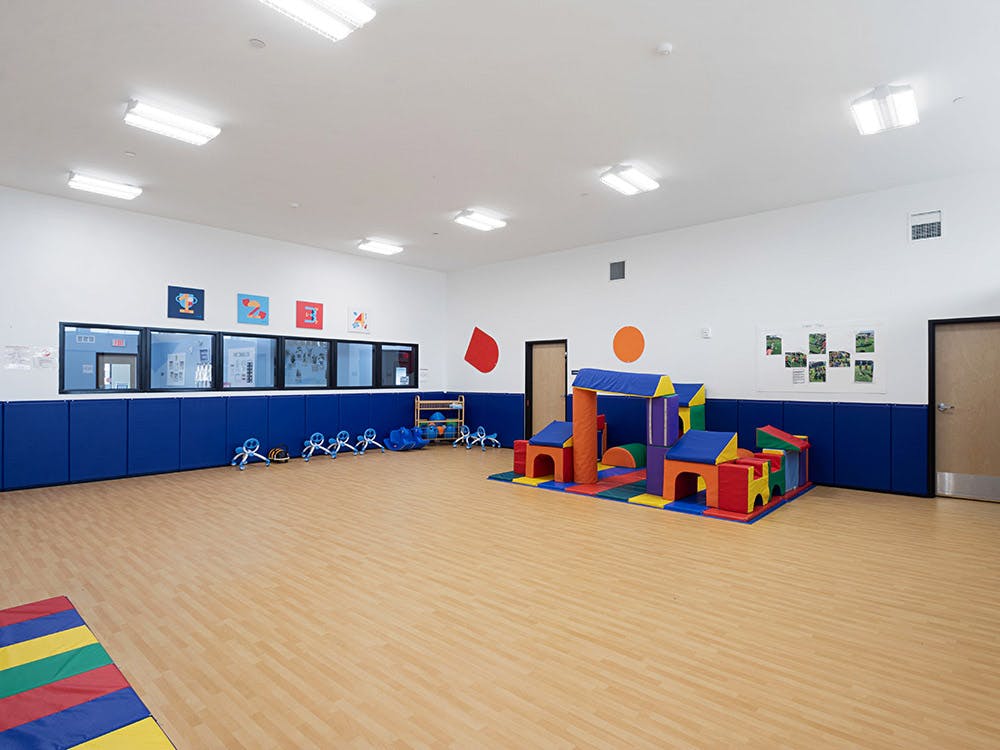 indoor playroom with soft play blocks and padded walls